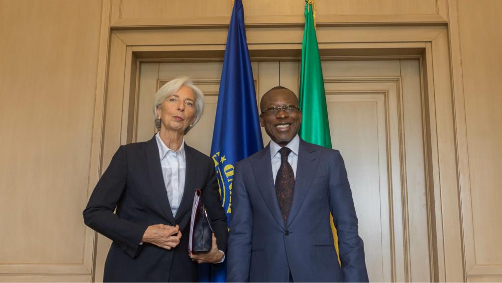 Christine Lagarde, directrice générale du FMI, aux côtés du président béninois Patrice Talon, le 11 décembre 2017 à Cotonou. / © YANICK FOLLY / AFP